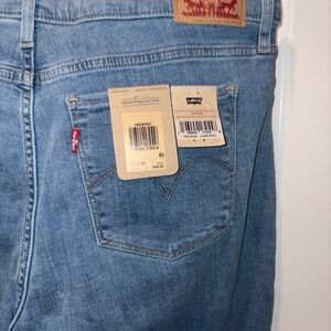 Levi's woman’s 311 shaping size 33/30 Denim Jeans in medium Blue NWT